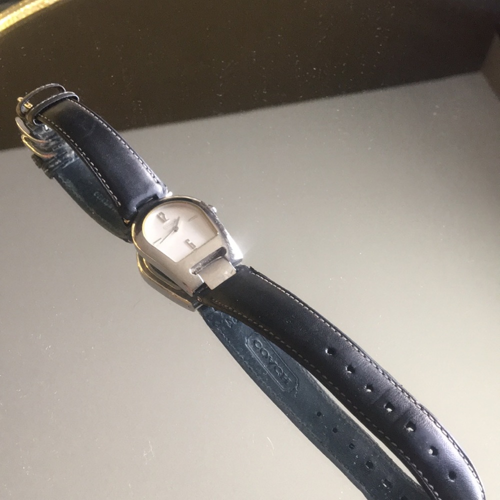 Black and silver coach watch
